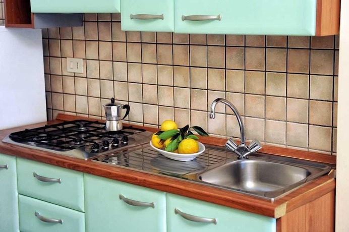 Imagen de la habitación del Hotel Villaggio Pineta Petto Bianco, Ricadi. Foto 5