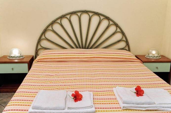 Imagen de la habitación del Hotel Villaggio Pineta Petto Bianco, Ricadi. Foto 8