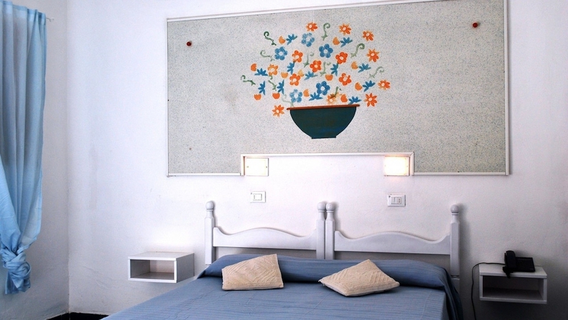 Imagen de la habitación del Hotel Villaggio Plaia. Foto 3