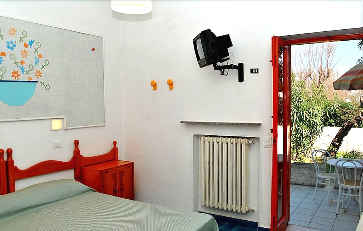 Imagen de la habitación del Hotel Villaggio Plaia. Foto 13
