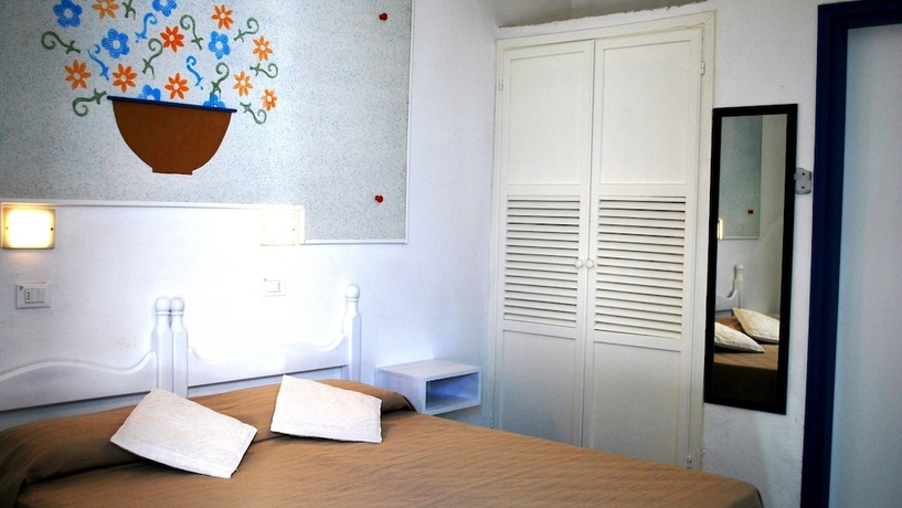 Imagen de la habitación del Hotel Villaggio Plaia. Foto 16