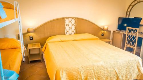 Imagen de la habitación del Hotel Villaggio Porto Rhoca. Foto 20