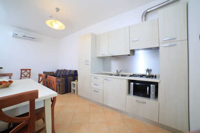 Imagen de la habitación del Hotel Villaggio Punta Grossa. Foto 2