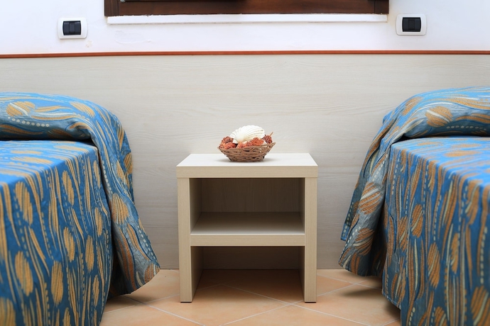 Imagen de la habitación del Hotel Villaggio Punta Grossa. Foto 3