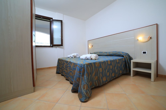 Imagen de la habitación del Hotel Villaggio Punta Grossa. Foto 7