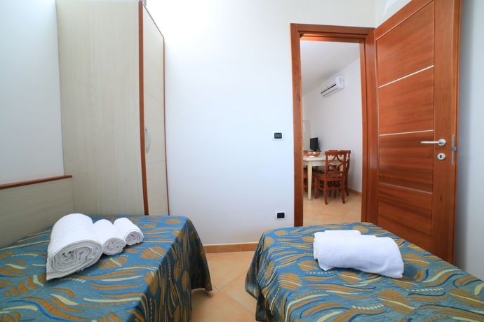 Imagen de la habitación del Hotel Villaggio Punta Grossa. Foto 8