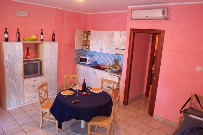 Imagen de la habitación del Hotel Villaggio Punta Grossa. Foto 11