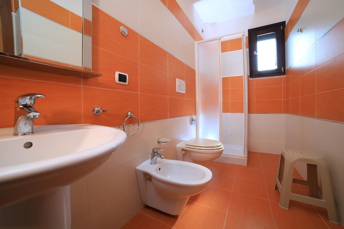 Imagen de la habitación del Hotel Villaggio Punta Grossa. Foto 16
