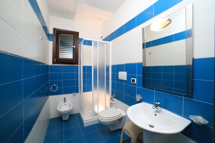 Imagen de la habitación del Hotel Villaggio Punta Grossa. Foto 17