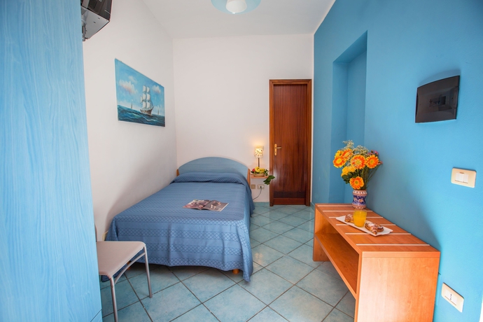 Imagen de la habitación del Hotel Villaggio Residence Testa Di Monaco. Foto 3