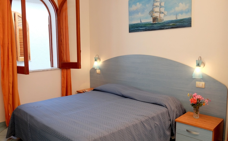 Imagen de la habitación del Hotel Villaggio Residence Testa Di Monaco. Foto 5