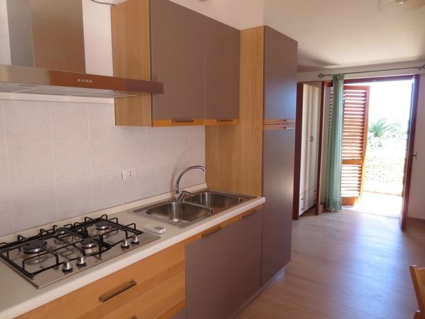 Imagen de la habitación del Hotel Villaggio Residence Testa Di Monaco. Foto 8