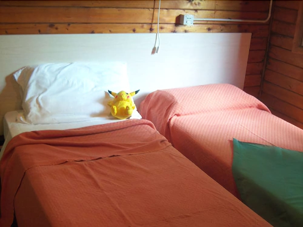 Imagen de la habitación del Hotel Villaggio Samoa. Foto 3