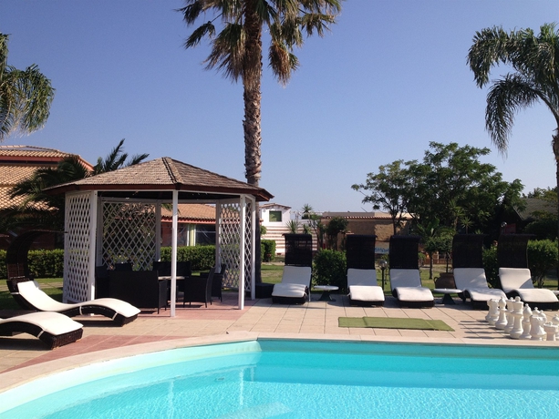Imagen de la piscina del Hotel Villaggio Spiagge Rosse. Foto 13