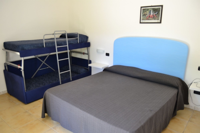 Imagen de la habitación del Hotel Villaggio Spiagge Rosse. Foto 4
