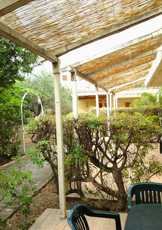 Imagen de la habitación del Hotel Villaggio Torre Macauda. Foto 7