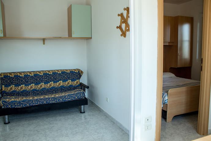 Imagen de la habitación del Hotel Villaggio Turistico Baia Del Monaco. Foto 9