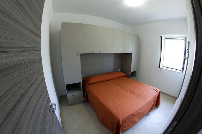 Imagen de la habitación del Hotel Villaggio Turistico Baia Del Monaco. Foto 14