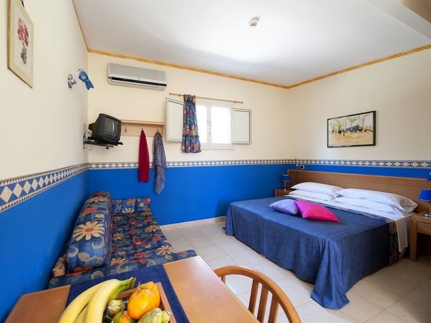 Imagen de la habitación del Hotel Villaggio Turistico Internazionale La Plaja. Foto 2