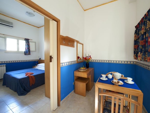 Imagen de la habitación del Hotel Villaggio Turistico Internazionale La Plaja. Foto 8