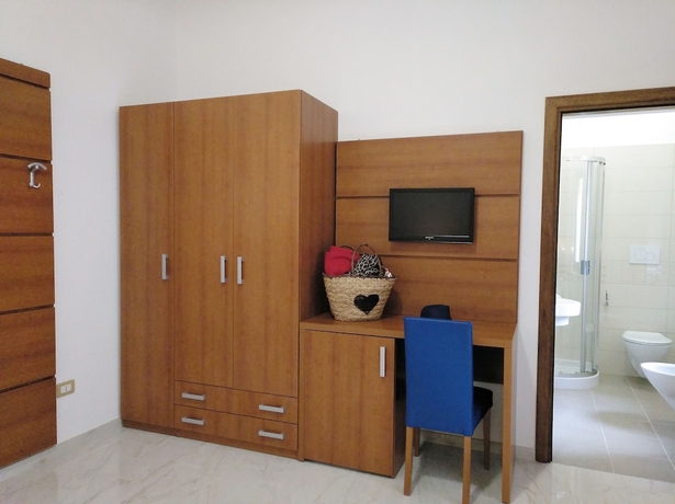 Imagen de la habitación del Hotel Villaggio Turistico La Mantinera. Foto 13