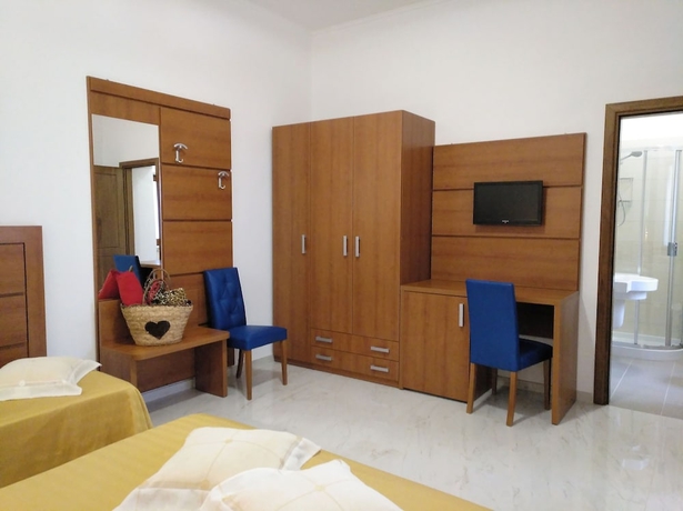 Imagen de la habitación del Hotel Villaggio Turistico La Mantinera. Foto 18
