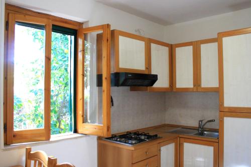 Imagen de la habitación del Hotel Villaggio Turistico Residence Delfino. Foto 19