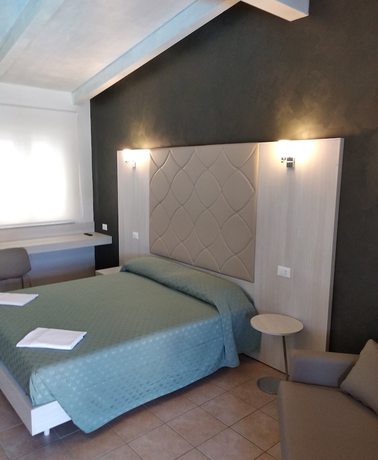 Imagen de la habitación del Hotel Villaggio Verde Cupra. Foto 16