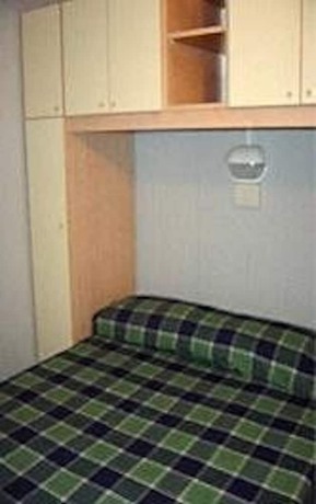 Imagen de la habitación del Hotel Villaggio Verde Cupra. Foto 18