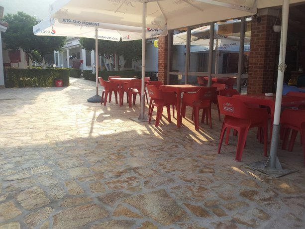 Imagen del bar/restaurante del Hotel Villaggio shehu. Foto 5