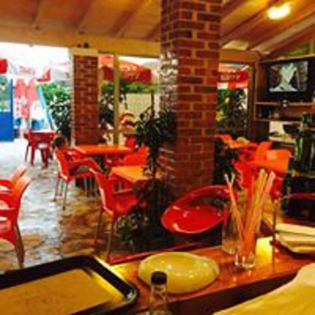 Imagen del bar/restaurante del Hotel Villaggio shehu. Foto 8
