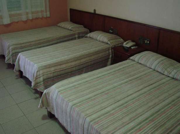 Imagen de la habitación del Hotel Villagio D'it&aacute;lia. Foto 8