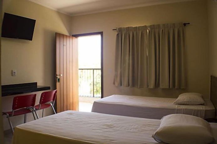 Imagen de la habitación del Hotel Villagio D'it&aacute;lia. Foto 11