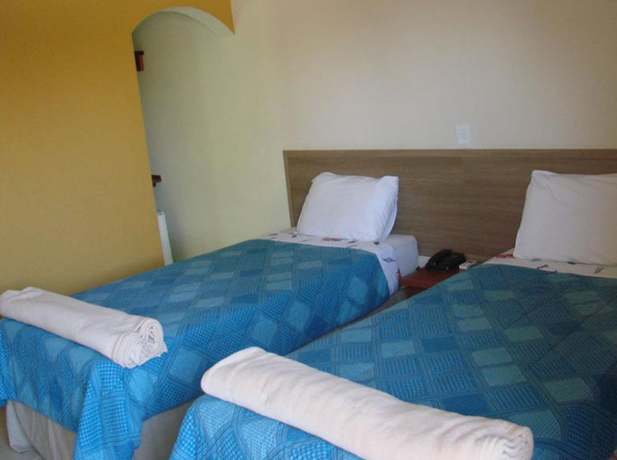 Imagen de la habitación del Hotel Villagio D'it&aacute;lia. Foto 17