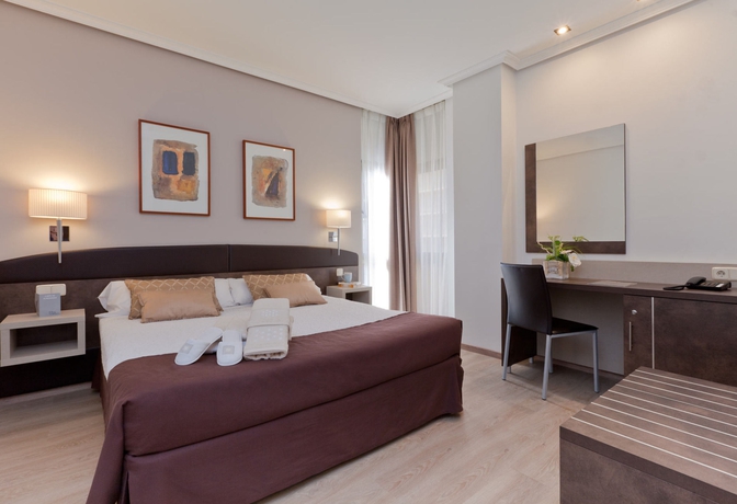 Imagen de la habitación del Hotel Villamadrid. Foto 16