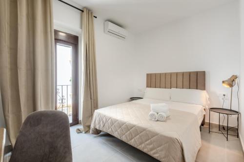 Imagen de la habitación del Hotel Villamarta Boutique Rooms. Foto 17