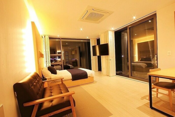 Imagen de la habitación del Hotel Villanoi Jeju. Foto 14