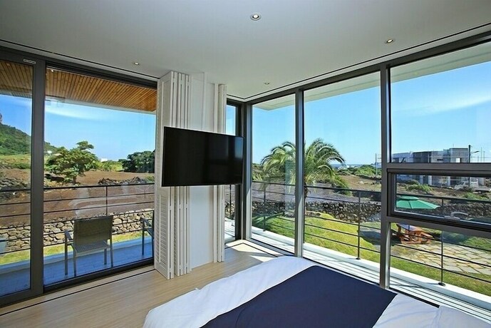 Imagen de la habitación del Hotel Villanoi Jeju. Foto 17