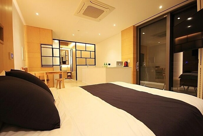 Imagen de la habitación del Hotel Villanoi Jeju. Foto 20