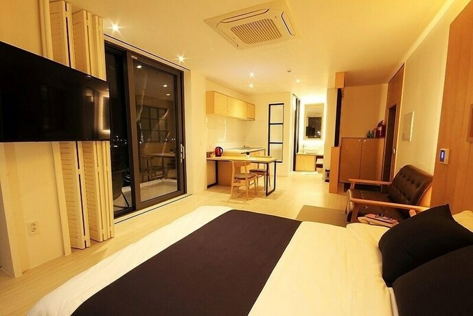 Imagen de la habitación del Hotel Villanoi Jeju. Foto 23