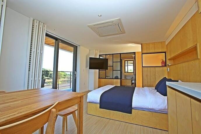 Imagen de la habitación del Hotel Villanoi Jeju. Foto 25