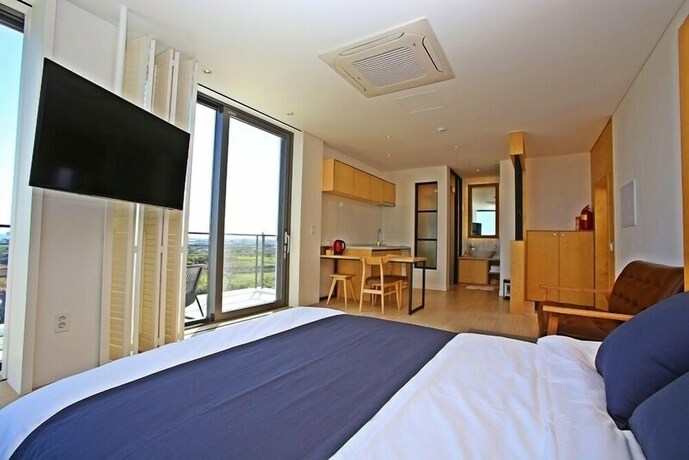 Imagen de la habitación del Hotel Villanoi Jeju. Foto 29