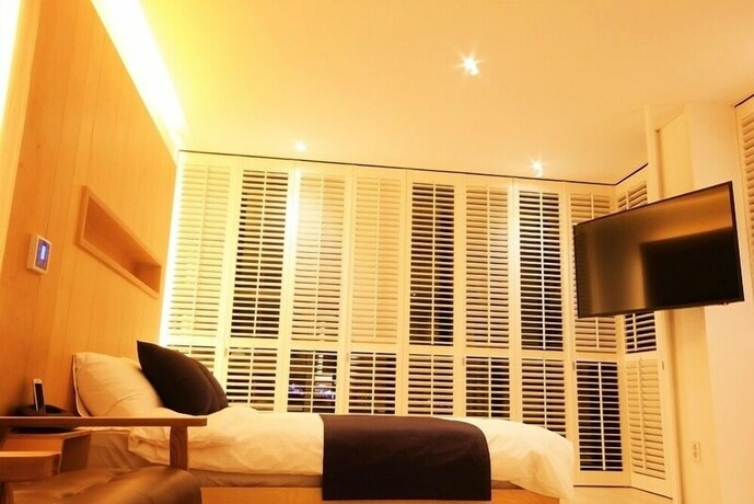 Imagen de la habitación del Hotel Villanoi Jeju. Foto 32