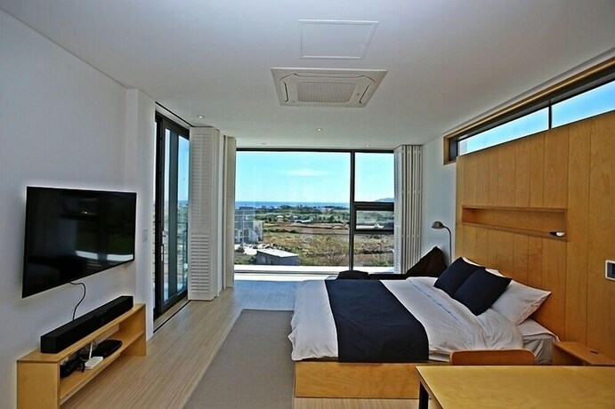 Imagen de la habitación del Hotel Villanoi Jeju. Foto 34