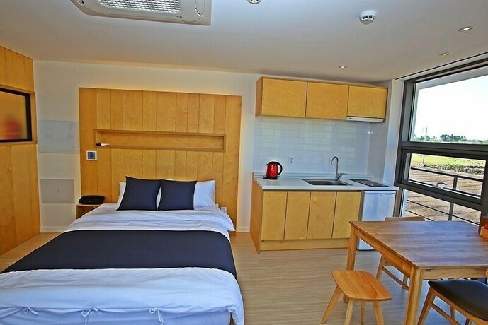 Imagen de la habitación del Hotel Villanoi Jeju. Foto 38