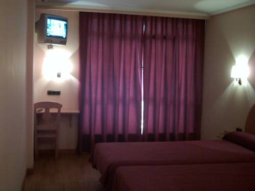 Imagen de la habitación del Hotel Villapaloma. Foto 16