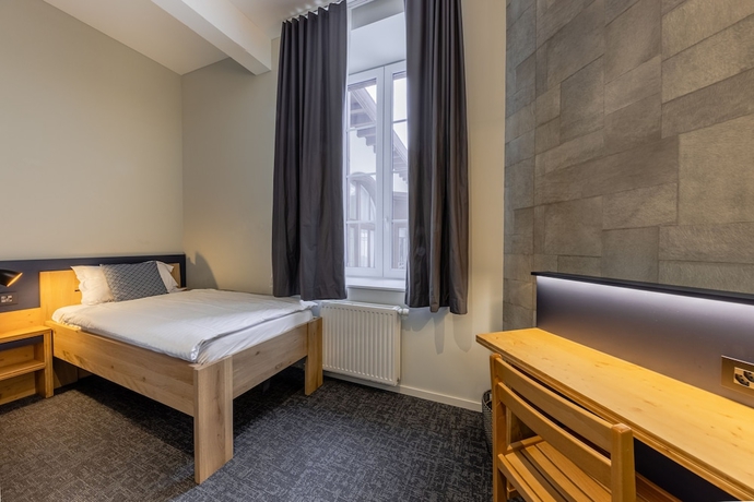 Imagen de la habitación del Hotel Villars Lodge. Foto 17