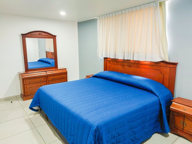 Imagen de la habitación del Hotel Villas Analco Apartments. Foto 2
