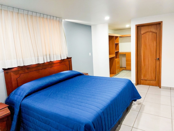 Imagen de la habitación del Hotel Villas Analco Apartments. Foto 4
