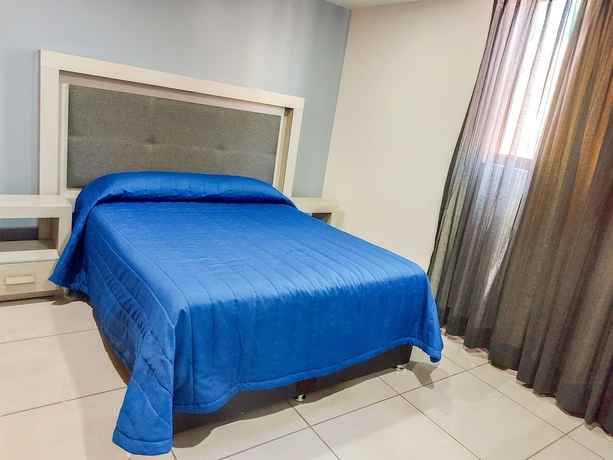 Imagen de la habitación del Hotel Villas Analco Apartments. Foto 5